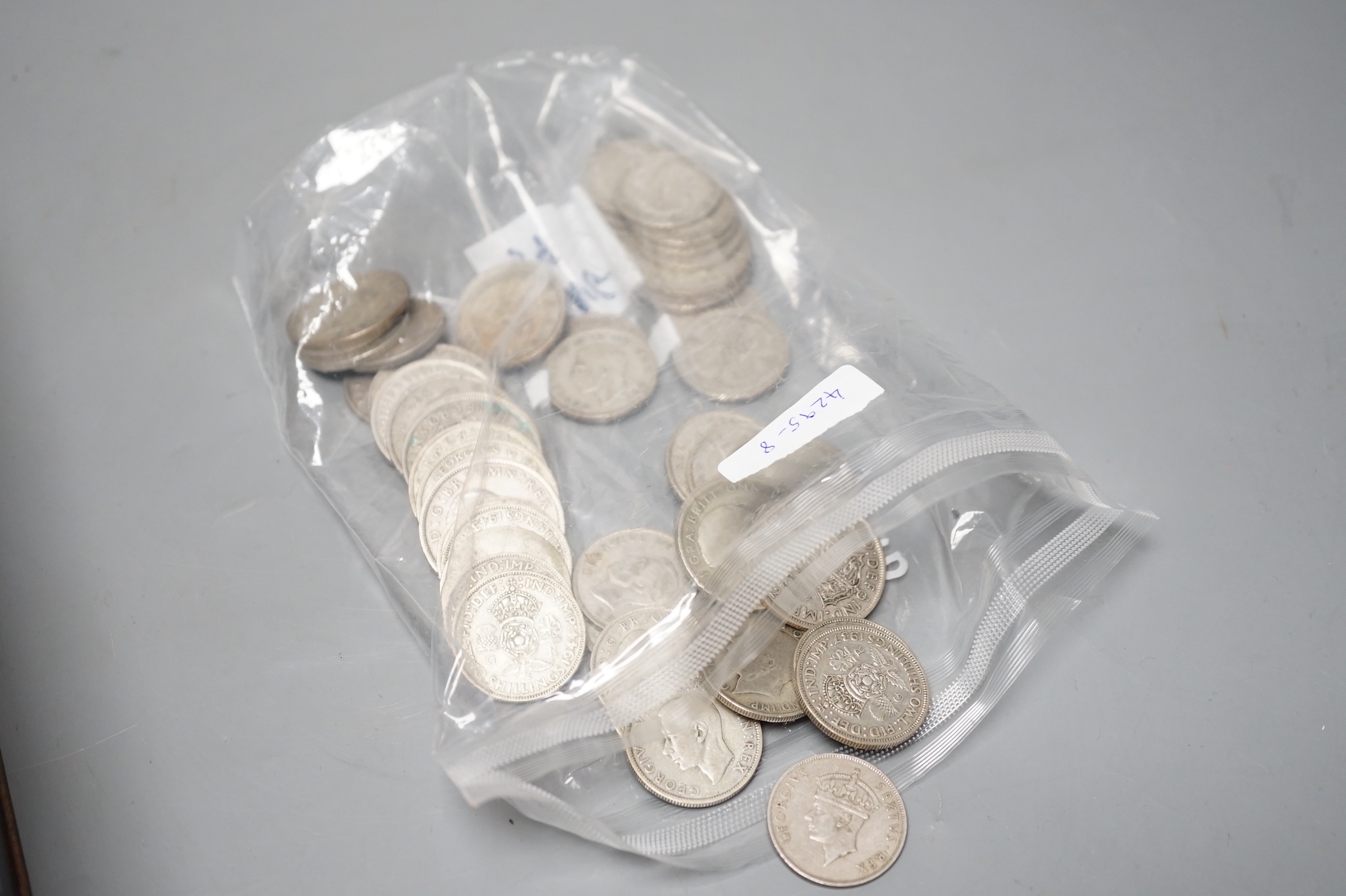 A 1976 French 50 Francs, and a collection of George V to QEII UK florins, shillings and threepence coins